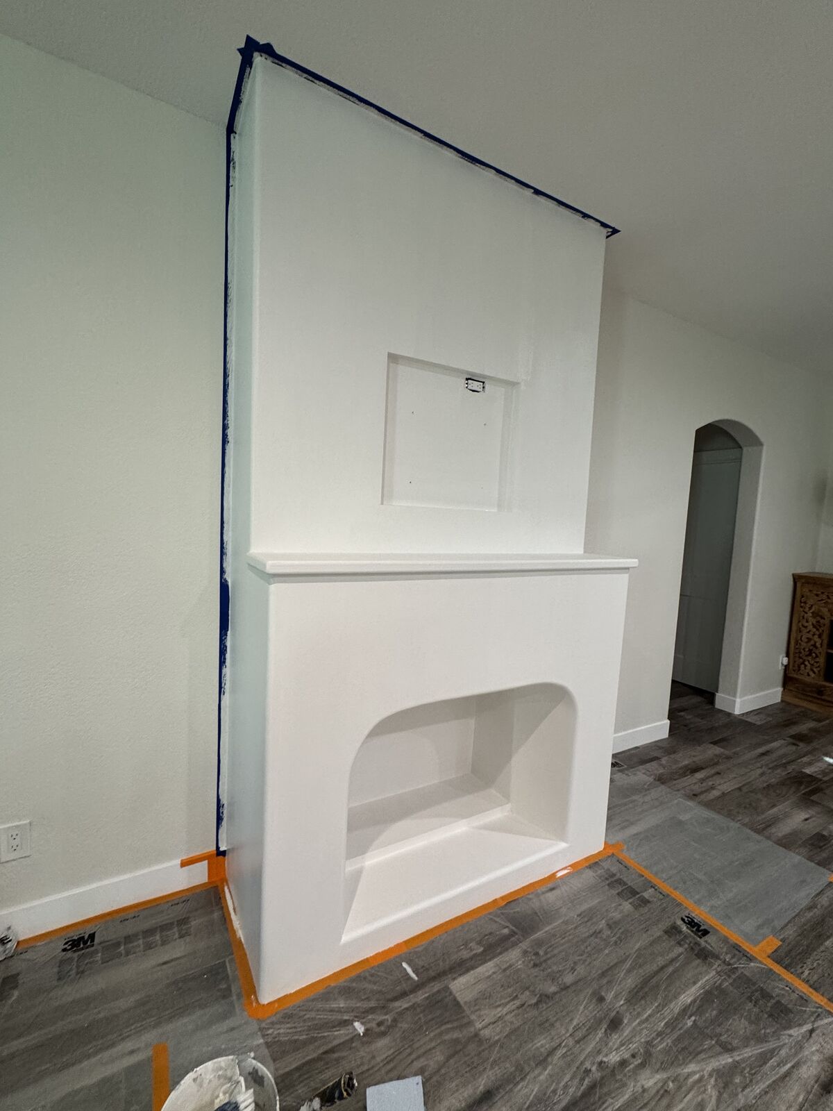 Fireplace primed and taped before limewash