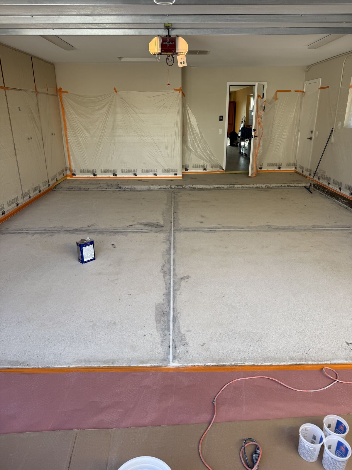 Garage concrete ground and prepped for coating